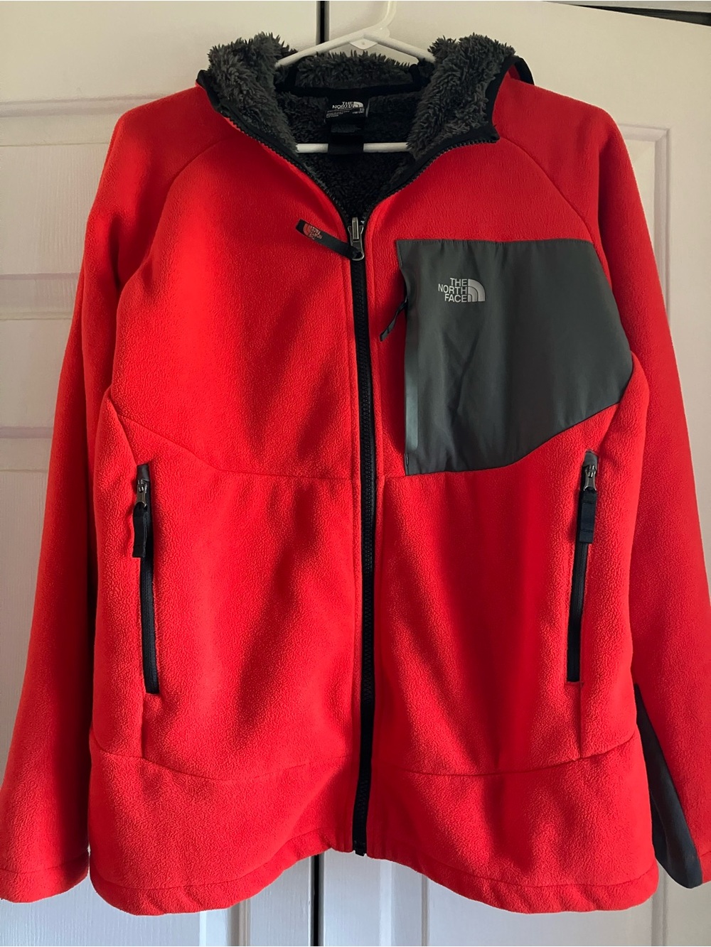 The North Face Youth Hooded Red Fleece Jacket with Dark Gray Chest Panel